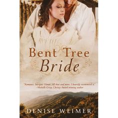 a man and woman standing next to each other in front of a wooden fence with the words bent tree bride written on it