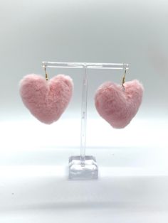 Complete your look with our Pink Fluffy Heart Earrings. These fun and festive accessories will add a touch of quirky cuteness to any outfit. Embrace your playful side and stand out from the crowd with these must-have earrings. Perfect for the fashion-forward and young at heart. Trendy Single Heart Earring For Valentine's Day, Trendy Single Heart Earring, Trendy Single Heart-shaped Earring, Playful Pink Earrings For Valentine's Day, Trendy Heart Shaped Earrings For Gifts, Trendy Heart-shaped Earrings For Gifts, Trendy Heart Charm Earrings For Valentine's Day, Trendy Heart Earrings For Valentine's Day, Trendy Party Heart Earrings With Heart Charm