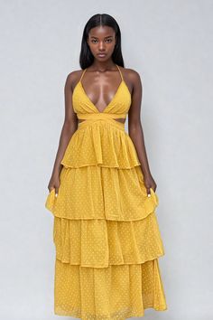 Ready to slay this summer? This flirty maxi dress has got you covered! With adjustable straps and an elastic back waist, you'll be comfortable and stylish all day long. The criss-cross back and ruffled design add a playful touch, while the mustard color adds a pop of personality. Model Specs: Model is wearing a Small Bust: 34'' Waist: 30' Women's Size 6 Height: 5'7" Size Recommendation: Size Down or order normal size Size Guide: Small | Women's 2-4 | Bust 33-35 | Waist 26-28Medium | Women's 6-8 Sundress Black Women, Flirty Maxi Dress, Flare Maxi Dress, Sundress Black, Sundress Outfit, Flirty Outfits, Summer Fairy, Ruffle Maxi Dress, Small B