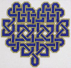 a cross stitch pattern with blue and yellow letters in the shape of an intertwined knot