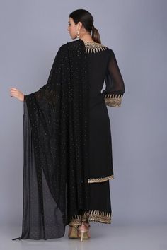 Black kurta featuring zari embroidery on the neckline and sleeve hem. Paired with a zari embroidered sharara and georgette dupatta. - Aza Fashions Elegant Black Floor-length Palazzo Set, Black Floor-length Palazzo Set For Party, Black Resham Embroidered Palazzo Set For Reception, Black Palazzo Set For Eid Reception, Black Palazzo Set For Reception During Eid, Elegant Black Salwar Kameez With Cutdana, Black Palazzo Set With Sheer Dupatta, Black Floor-length Palazzo Set For Festive Occasions, Black Floor-length Festive Palazzo Set