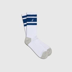 86% organic cotton, 12% nylon, 2% elastane Ribbed Stripe detail Embroidered star "A" logo White Stretch Cotton Socks, Sporty Breathable Cotton Socks, Breathable Cotton Sporty Socks, Breathable Cotton Sport Socks, Breathable Stretch Cotton Socks, Breathable Cotton Stretch Socks, Breathable Blue Cotton Socks, Comfortable Cotton Socks For Streetwear, Classic Cotton Socks For Winter