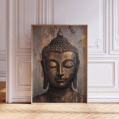 a painting on a wall with a buddha head in the center and white walls behind it