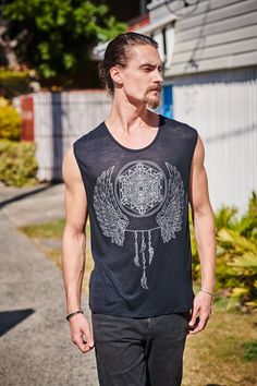 Men boho singlet, with a geometric print on the front, designed by a talented team of artists. This is a very comfortable and funky psytrance tank top. Great at festivals like Burning Man! 🔆Thank you for taking the time to visit our products! To find more men's tops, just follow the link  https://etsy.me/3RTneHr  Dear customers,  please note all items are hand dyed using natural products and slight shades of colour variations are part of this process. 🔆SIZE: Please refer to our size chart for Cotton Tank Top With Graphic Print For Festivals, Cotton Graphic Print Tank Top For Festivals, Bohemian Sleeveless Top For Music Festival, Festival Graphic Print Tank Tops, Graphic Print Tank Tops For Festivals, Casual Printed Festival Tank Top, Hippie Sleeveless Tops For Festival, Casual Printed Tank Top For Festivals, Sleeveless Printed Tops For Festivals