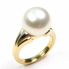 Absolutely gorgeous 100% authentic Australian South Sea white pearl ring in 14K two tone gold Pearl: 100% authentic top quality A grade (please refer to the below A-D pearl grading system for details.) Australian South Sea white pearl Pearl shape: round Pearl measurement: 11-12mm in diameter Luster: medium Nacre: greater than 0.8mm required by local law Color: white with possible pink or silver overtone Metal: selectable: 14K yellow gold, 14k white gold or 14K two tone gold (shown in the photo) Classic White Pearl Ring With Drop Detail, Classic White Akoya Pearl Ring, Classic White Pearl Ring With Polished Finish, Formal White Pearl Ring With High Luster, Formal White 14k Gold Pearl Ring, Classic White Gold Pearl Ring With High Luster, Classic White Gold High Luster Pearl Ring, High Luster White Pearl Ring For Anniversary, Formal White Pearl Ring With Polished Finish