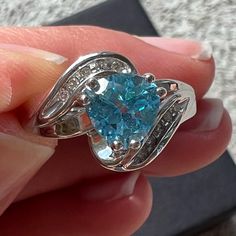 10k White Gold Blue Topaz Ring That's Accented With Diamonds. It's A Size 7 And Sparkles So Much! Looks Brand New! It Weighs Approximately 2.96 Grams. The Inside Is Stamped 10k. Box Not Included. Inventory 11 Topaz Diamond Ring, Blue Topaz Ring, Topaz Ring, Ring Size 7, Blue And Silver, Blue Topaz, Topaz, Diamond Ring, Ring Size