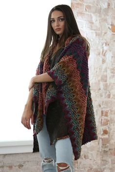 The Serene is a Multi-Colored Soft Popcorn Shawl with a variety of colors as well as a Zig-Zag pattern the possibilities are endless. Multi-Colored Knit Shawl One Size Fits All (Fits ALL Sizes) Material:100% Acrylic Color: Multi Multicolor Acrylic Outerwear For Layering, Multicolor Knitted Outerwear For Layering, Knitted Shawl Pattern For Fall, Casual Multicolor Knitting Pattern For Fall, Cozy Knitted Patterns For Fall, Cozy Multicolor Poncho For Fall, Cozy Multicolor Fall Knitting Pattern, Fall Shawl Knitting Pattern, Cozy Multicolor Fall Poncho