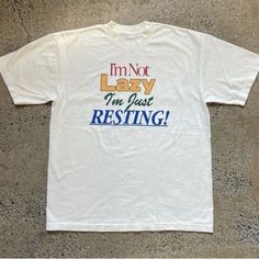 I’m Not Lazy I’m Just Resting T-Shirt Fast Shipping $25 Lowest I Can Do Custom Deadstock Hit Me With Questions White Casual T-shirt With Lettering, Retro White Tops With Lettering, Vintage Summer T-shirt With Funny Text, Vintage White Tops With Funny Text, Silly Shirt, White Shirt Outfits, Selling Clothes, 로고 디자인, Cool Tees