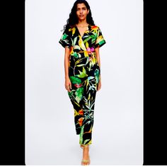 Gorgeous Zara Silk Jumpsuit Xs New Without Tags Beautiful With Black Jacket Or By Itself Tropical Printed V-neck Jumpsuits And Rompers, Multicolor Tropical Print V-neck Jumpsuits And Rompers, Casual V-neck Jumpsuits And Rompers With Tropical Print, Chic Multicolor Short Sleeve Jumpsuits And Rompers, Casual Black Printed Jumpsuit/romper, Casual Black Printed Jumpsuit, Green V-neck Tropical Print Jumpsuits And Rompers, Green V-neck Tropical Print Jumpsuit, Zara Green V-neck Jumpsuits And Rompers