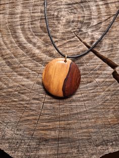 This pendant has been hand carved out of Organic Rosewood. All of my pieces are carved by hand using rescued wood from fallen trees or from carpenters leftovers. In this way I bring value to the precious woods coming from our forests protectors most magnificent trees. Brown Carved Round Pendant Necklace, Rustic Natural Wood Necklace, Barn Wood Projects, Necklace Tree, Wood Necklace, Autumn Trees, Round Pendant, Barn Wood, Wood Projects