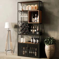 a shelf filled with bottles and glasses next to a lamp on top of a wooden floor