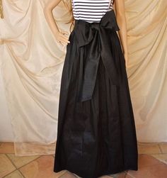 Handmade / Maxi Skirt / Long Skirt / Skirt with Sash /Black or Yellow / Pleated Skirt / Womens Skirt / Ladies Skirt / Tea Length by Breauxs on Etsy https://www.etsy.com/listing/194793385/handmade-maxi-skirt-long-skirt-skirt Elegant Fitted Skirt With Bow Detail, Elegant Fitted Skirt With Bow, Formal Tiered Maxi Skirt For Summer, Formal Summer Tiered Maxi Skirt, Elegant Tiered Wrap Skirt For Party, Party Maxi Length Dress With Gathered Skirt, Black Full Skirt Maxi For Wedding, Party Dress With Gathered Skirt In Maxi Length, Black Tiered Maxi Skirt For Wedding