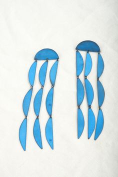 These stunning Rain Blue Earrings are carefully crafted by hand for a lightweight and comfortable fit. Their unique beautiful blue color adds a special touch to any outfit. Moma Shoes, Annie Costello Brown, Rain Blue, Farmhouse Pottery, Christian Wijnants, Pamela Love, Black Crane, Bar Accessories, Blue Earrings