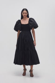 Casa Puff Sleeve Midi Dress | Black | Aje – Aje World Fitted Midi Dress With Ruched Tiered Skirt, Puff Sleeve Midi Dress With Ruffles, Fall Puff Sleeve Midi Dress With Ruffles, Fall Midi-length Puff Sleeve Dress With Ruffles, Fall Midi Puff Sleeve Dress With Ruffles, Knee-length Midi Dress With Gathered Sleeves For Evening, Voluminous Midi Dress With Balloon And Gathered Sleeves, Workwear Midi Dress With Puff Elastic Sleeves, Voluminous Evening Dresses With Elastic Sleeves