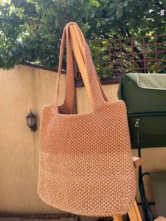 Upgrade your everyday style with this beautiful handmade brown crochet tote bag! Perfect for everything from grocery shopping to beach days, this versatile bag combines functionality and boho charm. Crafted with care and precision, it's the ideal accessory for women who love unique, sustainable fashion. 🌟 Key Features: Material: Made from eco-friendly, durable yarn that's lightweight yet strong. Color: Warm brown shade that complements any outfit, perfect for all seasons. Design: Spacious inter Brown Crochet Tote Bag, Boho Market, Summer Handbag, Brown Crochet, Jute Tote Bags, Jute Totes, Everyday Purse, Summer Handbags, Brown Shade