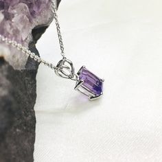 PRODUCT INFO : Stone : Natural Amethyst Stone size : 8x10 mm octagon Metal type : Sterling silver (92.5) Approximate weight : 1.8 grams ABOUT AMETHYST GEMSTONE : AMETHYST, often viewed as a stone of peace, some believe amethyst's calming presence produces soothing dreams by bringing the dreamer more in tune with the Divine. This clarity and peacefulness also extends to the waking mind. Amethysts are said to help the mind flow freely in both mental and metaphysical dimensions. Amethyst is a busy Emerald Cut Amethyst Birthstone Jewelry, Sterling Silver Jewelry With Rectangular Stone And Prong Setting, Sterling Silver Jewelry With Rectangular Stone In Prong Setting, Sterling Silver Jewelry With Rectangular Prong Setting, Amethyst Rectangular Gemstone Jewelry, Rectangular Amethyst Gemstone Jewelry, Silver Octagon Birthstone Jewelry, Silver Octagon Jewelry With Birthstone, Lavender Amethyst Jewelry With Prong Setting