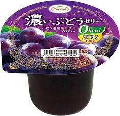 plums are in a plastic container with chinese writing on the front and back side