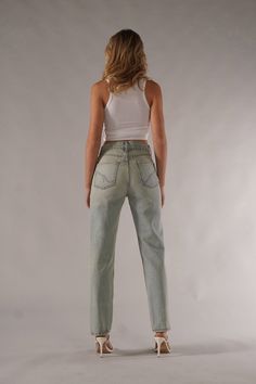 DESCRIPTIONThe Ex-Boyfriend is back and better with our newest wash— Rickie. This vintage-inspired, light wash is the perfect addition to everyone’s closet. The Ex-Boyfriend is a wedgie fit featuring a fitted waist and a straight leg bottom that flatters your bum while elongating your legs. DETAILSHigh-Rise Style Straight Leg Vintage Wash Button Fly 30" Inseam14" Leg Opening100% Cotton Model is 5'7 wearing size 24. CRAFTED BY HAND, JUST FOR YOU Size up if measurements are in between sizes.