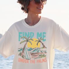 Find Me Under the Palms T Shirt, Comfort Colors Beach Tee, Summer Vacation T Shirt, Summer Vibes Shirt, Summer Tropical T Shirt Embrace the Call of the Tropics. Add the "Find Me Under the Palms" t-shirt to your collection today and keep the spirit of summer alive all year round. Perfect as a thoughtful gift for the adventurer in your life or a treat for yourself. Pair it with your favorite shorts for a day at the beach or layer it under a denim jacket for a chic, urban look. CARE INSTRUCTIONS * DO NOT iron directly on design. * DO NOT dry clean * Machine wash COLD with mild detergent * Turn inside out when washing * Dry on low setting or hang to dry * Do not use bleach Vacation T Shirt, Beach Tee, Summer Tropical, The Palms, Urban Looks, Clean Machine, Summer Vacation, Comfort Colors, Summer Vibes