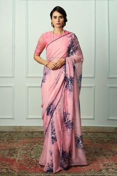 Pink french chiffon saree with floral print and satin piping. Comes with an organza embroidered unstitched blouse piece.
Components: 2
Pattern: Printed, Embroidered
Type Of Work: Floral
Fabric: Saree : French chiffon, Blouse Piece : Organza
Color: Pink
Other Details: 
Length :
Saree : 5.5 mtrs
Unstitched Blouse : 1 mtr
Note : Stitched blouse worn by the model is not for sale.
Occasion: Wedding - Aza Fashions Pink Organza Saree, Floral Print Saree, Dress Saree, Saree Blouse Styles, Peach Saree, Anushree Reddy, Floral Print Sarees, Floral Saree, Pink French