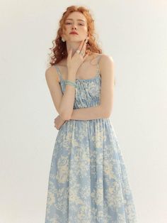 This is a romantic and feminine dress by Sincethen that is made out of high quality and sturdy material. With distinctive mood of the design and comfortable wear, you can style it for your casual daily outfit.- Natural shirring detail overall- Adjustable shoulder straps- Romantic and feminine mood Ruched Sundress With Ruffled Straps For Daywear, Spring Ruched Sundress For Daywear, Casual Midi Dress With Ruffled Straps, Casual Midi Dress With Adjustable Straps For Garden Party, Feminine Smock Midi Dress For Summer, Feminine Summer Midi Dress With Smock Details, Feminine Summer Midi Dress With Smock, Spring Smock Dress With Ruffled Straps, Spring Dresses With Smock Detail And Ruffled Straps