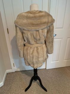 This nice Vintage 1950's 60's Tan Fur coat comes to you with suede under arm in a belted style comes to you in a size M-L. As you can see from the pictures of the inside of the coat-Amazing satin lined-The belt is made of suede leather-Pls compare the measurements I give you to those in your closet-They are as follows- Vintage Long Sleeve Belted Outerwear, Fitted Vintage Outerwear With Belt Loops, Vintage Fitted Belted Outerwear, Fitted Vintage Belted Outerwear, 80s Prom Dress, Velvet Cream, Tan Jacket, Maxi Dress Prom, Cream Lace