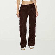 Cold-weather style isn't complete without a great pair of corduroy pants like this cargo pair from Forever 21's junior's and womens collection. They are made from soft cotton with a button-zip fly with an elastic-waistband, utility-style pockets, and wide legs.Closure Type: Button & ZipperFit: Baggy FitPockets: 2 Cargo Side Pockets, 2 Side Slip Pockets, 2 Back Flap PocketsRise: Mid RiseFiber Content: 100% CottonFabric Description: CorduroyInseam: LongLeg Style: Wide LegCare: Machine Wash, Tumble Y2k Parachute Pants With Pockets For Fall, Y2k Fall Cargo Pants, Y2k Style Fall Pants With Side Pockets, Y2k Cargo Style Pants For Fall, Y2k Fall Pants With Side Pockets, Y2k Cargo Pants For Fall, Y2k Pants With Side Pockets For Fall, Y2k Cargo Style Bottoms For Fall, Fall Y2k Cargo Pants