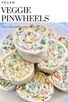 vegan veggie pinwheels on a white plate with text overlay