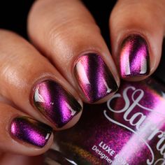 Starrily Velvet Sky Dive Nail Polish: Overview:• Pink, purple, gold color shifting magnetic nail polish• Can be magnetized with a magnetic tool, sold separately• Best applied in 2-3 coats or 1-2 coats over Vantablack Description: High above the Winter Carnival, lies the Velvet Sky Dive, a ride that promises to take you on a surreal journey. The ride is a magnificent structure, adorned with hues of deep pink, soft purple, and glints of gold, mimicking the captivating colors of the setting sun. It's as if the ride itself is a piece of the twilight sky, brought down to earth for the carnival-goers to experience. As the ride begins, you are swiftly lifted into the air, and the world below slowly fades away. The sky around you transforms into a canvas of pink, purple and gold, the colors swirli Sky Dive, Velvet Sky, Magnetic Nail Polish, Winter Carnival, Twilight Sky, Magnetic Nails, Color Swirl, Indie Nail Polish, Setting Sun