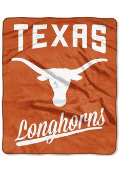 You'll love displaying this Texas Longhorns Raschel Blanket, which features a team name and logo. This Raschel Blanket will keep you warm at home or cheering on your Longhorns from the stands. Measures 50" x 60", 100% Polyester, Bright, sublimated printed graphics, Machine Washable, Imported Texas Longhorns Football, Longhorns Football, School Logo, Cozy Throw Blanket, College Team, Silk Touch, Alma Mater, Texas Longhorns, Cozy Throws