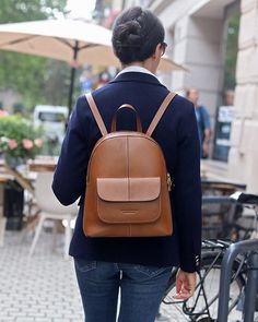 Elegant Italian leather backpack - A Stylish and Functional brown rucksack for the Modern Woman a must-have everyday bag Discover the perfect blend of style and function with our luxurious women's leather backpack. Crafted from the highest quality leather in a rich brown shade, this elegant backpack is the ideal choice for any woman who values both comfort and refined Italian design. As a versatile city backpack, it seamlessly combines the aesthetics of a modern backpack with the practicality ne Brown Leather Backpack With Adjustable Strap For On-the-go, Modern Brown Backpack For On-the-go, Large Capacity Leather Backpack For School, Brown Bags For Daily Use And Back To School, Large Capacity Leather Backpack For Back To School, Soft Leather Softback Backpack For On-the-go, Brown Large Capacity Satchel For Back To School, On-the-go Soft Leather Softback Backpack, Brown Softback School Bag