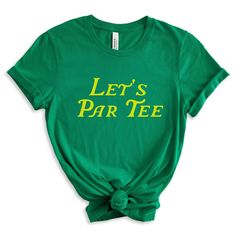 a green t - shirt with the words let's par tee on it