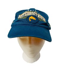 This Vintage Hat from Bitterroot River Montana Freestone Fly Shop is a stylish blue baseball cap. It's unisex and has an adjustable size for a perfect fit.  * Blue, vintage-style baseball cap * From Bitterroot River Montana Freestone Fly Shop * Unisex design * Adjustable size for a perfect fit * Buckle closure * Embroidered Features: * Base Bal Hat Size: Adjustable Condition: Pre-Owned Good Blue Sports Bucket Hat, Blue Bucket Hat For Sports, Blue Cap For Outdoor Activities, Blue Baseball Cap With Visor For Outdoor Activities, Blue Fitted Hat For Outdoor, One Size, Blue Dad Hat For Outdoor, Blue Fitted Baseball Cap For Outdoor, Blue Adjustable Baseball Cap For Outdoor, Blue Dad Hat For Outdoor, One Size