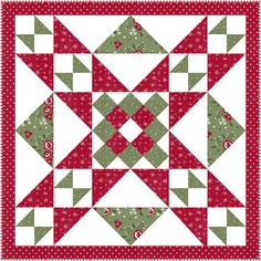 a red and green christmas quilt