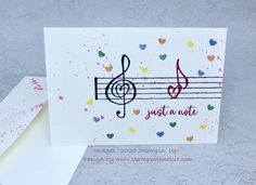 a card with music notes and hearts on it, next to a note that says just a note