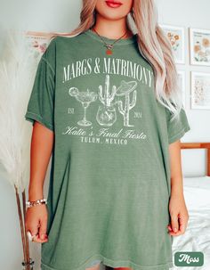 "Personalized Margs and Matrimony Bachelorette Party Shirts, Custom Mexico Bachelorette Tees, Final Fiesta Bach Shirts, Mexican Wedding Trip Shirts, Bride and Bridesmaid Outfits, Personalized The Bach Club Shirts, Trendy Luxury Bachelorette Shirts ✧ WHY  YOU'LL  LOVE IT ✧  ⋒ Comfort Colors® tees are garment-dyed shirts that are timeless classics and will never pile.  ⋒ Trendy retro vintage look and gorgeous colors.  ⋒ Amazingly soft and comfy. Perfect with any shorts, skirts, jeans, leggings, or Short Sleeve Summer Wedding Tops, Summer Wedding Tops With Short Sleeves, Summer Wedding Tops With Graphic Print, Fitted Crew Neck Top For Wedding, Tequila Bachelorette, Bach Shirts, Final Fiesta Bachelorette Party, Bachelorette Tshirt, Final Fiesta Bachelorette