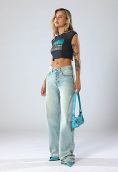 DESCRIPTIONThe hottest trend in denim for this season! The oversized jean features a cross waistband and baggy pant is now available in our vintage-inspired Seattle Blue wash. Model is wearing size 25 DETAILSFront Rise: 11 3/4”Leg Opening: 21”Inseam: 33 1/2“100% Cotton Denim CRAFTED BY HAND, JUST FOR YOU. Cargo Jumpsuit, Oversized Jeans, Denim Crafts, Baggy Pant, Jeans Size Chart, Premium Denim, 70s Fashion, The Body Shop, Hottest Trends