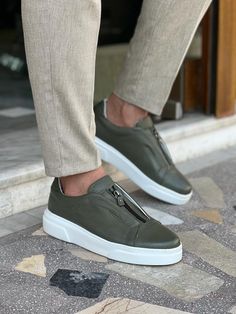 The Lawson Green Mid-Top Zipper Sneakers epitomise sophistication and comfort, making them the perfect choice for the modern man. Made from high-quality leather with a calf skin inner lining, these sneakers are not only stylish but also provide exceptional comfort for everyday wear. The versatile design allows for seamless transitions from casual outings to more formal settings. Complete your look with this stylish footwear that embodies elegance and practicality, suitable for business meetings, Black Monks, Gents Shoes, Ballet Socks, Double Monk Strap, Fashion Man, Sole Sneakers, Mid Top, Shoe Gifts, Eva Sole