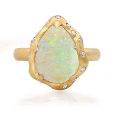 Our Pear Moonstone and diamond ring in 14K yellow, rose, and white gold are set with shimmering white diamonds. The ring also comes custom made in Opal. 14K & 18K yellow, rose, or white gold 1 Opal 53 diamonds 9.49 grams gold Available in rose, yellow, or white gold Made in Los Angeles Complimentary gift wrapping Opal And Diamond Ring, Bezel Set Earrings, Signature Bracelet, Diamond Stacks, Bridal Diamond Jewellery, Anchor Necklace, Linking Rings, Diamond Education, Bridal Bands