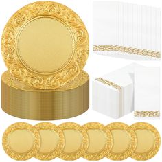 a set of gold plates and napkins