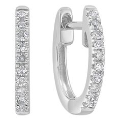 Simple yet stunning, these Diamond huggie hoops are crafted from 14k gold with 20 glittering white 0.06 ct. of diamonds. Each delicate U-shaped hoop features a single line of white diamonds, pave-set across the face in a gorgeous display. 1/2" in diameter. -14K Gold -0.06 ct. White Diamonds -Natural Round White Diamonds -Diamond Color GH -Clarity SI1 -10MM Diameter -Gift Box Included Single Line, La Face, Huggie Hoop Earrings, Jewelry Earrings Hoops, White Diamonds, Diamond White, Colored Diamonds, Diamond Bracelet, The Face