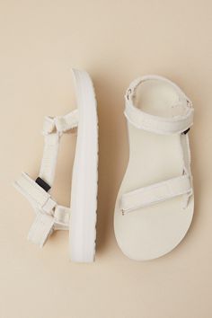 However you style the Teva Midform Universal Birch Canvas Sandals, they are sure to make any of your summer 'fits even more cute and comfortable! These sandals feature 100% recycled polyester canvas straps (adorned with trendy frayed trim) that shape an adjustable VELCROÂ® toe strap that leads to a matching quarter strap. An on-trend, flatform foam sole completes the summer-ready look! Logo tag accents outstep strap. Available in whole sizes only. 1. 25" flatform sole. Lightly cushioned insole. Teva Midform, Wineries Outfit, Canvas Sandals, Logo Tag, Dress Shoes Womens, Summer Fits, Summer Ready, Blue Shoes, Platform Shoes