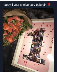 a bouquet of roses and a photo frame with the number one on it