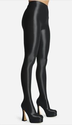 - Stretch spandex upper-black lycra material, with a platform sole, a square toe, flared block heel and a long legging boot design. -14cm/5.5 inch height round heel Spandex Leggings Outfit, Stocking Boots, Legging Boots, Lycra Material, Elegant Style Women, Lycra Leggings, Boot Design, Shiny Leggings, Long Leggings