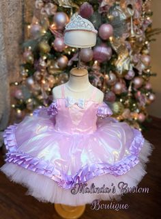 Pink and purple ballerina dress with matching pearl tiara . It's a short upper thigh cut with full fluffy layers of tulle . Purple trimmed details and great for any event. Shades of purple may be adjustable as ribbon available may not be exact shade but close. Fitted Balletcore Fairy Dress, Balletcore Party Fairy Dress With Ruffles, Balletcore Fairy Dress With Ruffles For Party, Lavender Fitted Princess Dress For Dress-up, Princess Style Lavender Fairy Dress For Party, Pink Fitted Fairy Dress For Costume Party, Pink Fitted Fairy Dress For Parties, Fitted Pink Fairy Dress For Party, Pink Fitted Princess Fairy Dress