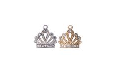 Crown Cubic Zirconia Charm This crown cubic zirconia charm measures 10mm x 9.75mm. Sold by the Piece. Available in Silver & Gold 100% Lead-safe. Nickel-free Hypoallergenic Core Metal: Brass. Care Tips: Do not swim or bathe with this jewelry. Try not to spray perfume or rub lotions on this product as it could mar the finish. To clean, use gentle hand soap and warm water. Pat dry with a paper towel. Do not use jewelry cleaners or a jeweler's cloth. Read more about how to take care of plated jewelr Crown Charm, Spray Perfume, Perfume Spray, Seychelles, Mozambique, Guinea Bissau, Warm Water, Hand Soap, Silver Gold