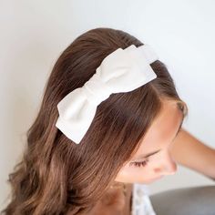 The Ava Velvet Bow Headband is the perfect accessory for both girls and women. Each headband is handmade with soft velvet ribbon, and features a double stacked bow on the side. Whether for everyday wear or special occasions, this headband is sure to add that final touch to any outfit. Dimensions: Bow 3" W x 7" L, Headband 1" wide Velvet Bow, Final Touch, Velvet Ribbon, Bow Clips, Bow Headband, Soft Velvet, For Girls, Special Occasion, Everyday Wear