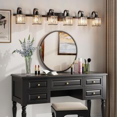 a vanity with a mirror, stool and lights on the wall in front of it