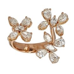 This exquisite 18kt gold ring features 2.79cts of sparkling marquise and pear shaped diamonds arranged as three beautiful flowers. This ring is available in rose, yellow or white gold. Handcrafted in Italy by ZYDO Italian Jewelry.Diamond Quality: Color F, Clarity VSDiamond Carat Weight: 2.79Dimension: Width: 1 in. Butterfly Diamond Ring, Ring Sketch, Jewelry Photography Styling, Chrome Nail, Gold Rings Fashion, Italian Jewelry, 18k Gold Jewelry, Floral Jewellery, Fine Jewellery