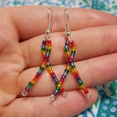 These Earrings Are Perfect To Wear To Your Local Pride Festival/Parade, To Complete A Colorful Concert Outfit, Or Any Time You Feel Like Showing Off Your Unicorn Spirit! Lightweight, Genuine Silver Plated Findings Handmade By Me! Brand New With Tags Sterling Silver Plated Earrings And Wire Colored Glass Seed Beads In Red, Orange, Yellow, Green, Blue, And Purple. Rainbow! 2" Long From Top Of Ear Wire To Bottom Of The Dangle Colorful Concert Outfit, Pride Festival, Ribbon Earrings, Purple Rainbow, Local Pride, Red Orange Yellow, Rainbow Earrings, Themed Jewelry, Glass Seed Beads